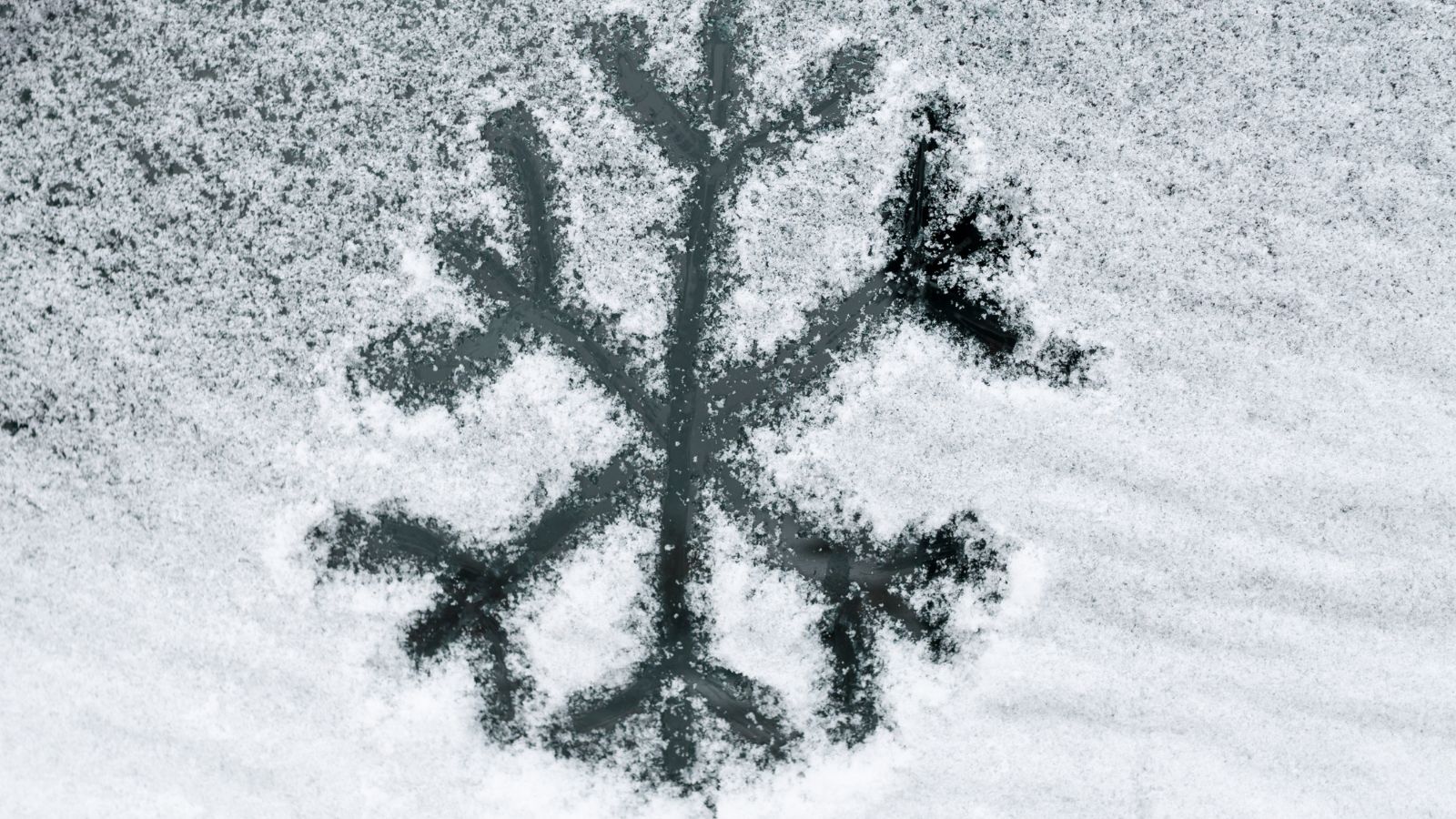 Imatge de vidre glaçat amb dibuix d'un floc de neu